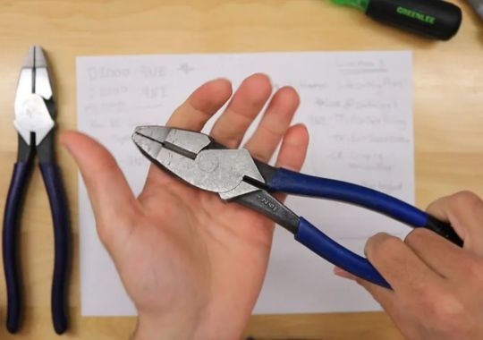 A person showing a klein pliers.